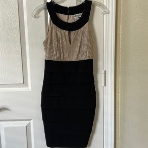 Sweet storm, gold and black dress, never worn, size s